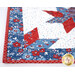 A close up on one corner of the runner, demonstrating patchwork details.