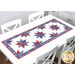 The completed Floating Stars Runner, staged on a white table.