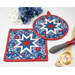 A shot of both the round and square hot pads, demonstrating fabric colors and prints.