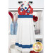 The completed Hanging Towel Kit colored in red, white, and blue fabrics from the Front Porch Charm collection from Blank Quilting, hung on a drawer surrounded by coordinating patriotic décor. 