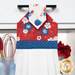 A close up shot of the top of the hanging towel, showing details on the patriotic fabrics.