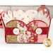 A shot of the side of the Basket, showcasing the fabric prints and colors as well as the button details.