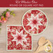 The two completed red Folded Star Hot Pads, one round and one square, slightly overlapping each other and staged on a wooden table with coordinating floral décor.