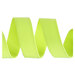A neon yellow ribbon, curled and resting on a flat surface.