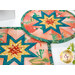 A closer look at the two Folded Star Hot Pads, demonstrating fabric color and print details.