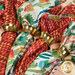 A closer look at the four napkins, demonstrating fabric print and color details.
