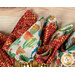 A closer look at the four napkins, demonstrating fabric print and color details.