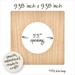 Back of square embroidery hoop frame with wood veneer finish.