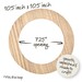 Back of round embroidery hoop frame with wood veneer finish.