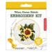 Packaging for a mini cross stitch embroidery kit featuring a sunflower design, includes needle and yarn.