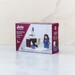 The angled front of the Sallie Tomato Sewist Building Block Set box, staged on a marble countertop and showcasing the completed set.