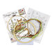 The contents of the Deer cross stitch picture kit, including fabric, needle, hoop, floss, and the pattern.