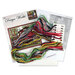 The contents of the Open for Business cross stitch picture kit, including fabric, needle, hoop, floss, and the pattern.