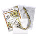 The contents of the Amazing Grace cross stitch picture kit, including fabric, needle, hoop, floss, and the pattern.
