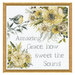 a framed and completed cross-stitch design depicting yellow and green hued florals, a small bird, and the words "amazing grace, how sweet the sound."