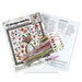 The contents of the Watercolor Fox cross stitch picture kit, including fabric, needle, hoop, floss, and the pattern.
