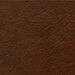 A close up swatch of textured Brown Legacy Faux Leather.