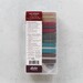 Assorted zippers and pulls in a clear plastic case with a label on top describing what is in the bundle.