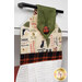 An angled close up on the top of the towel, demonstrating fabric colors on the prints and fabric button.
