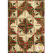 A closer look at the quilt, showing details on the creative log cabin and cactus block layout.