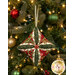 A closer look at the fabrics of the ornament, showing print colors and details.