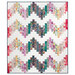 The completed Ridiculously Easy Jelly Roll Quilt colored in vibrant watercolor prints from the Soulstice collection by Moda Fabrics, isolated on a white background. 
