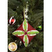 A closer look at the bright green, red, and cream fabrics of the ornament, showing print colors and details.