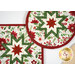 A closer look at the two Folded Star Hot Pads, demonstrating fabric color and print details.