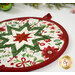 A closer look at the round Hot Pad, demonstrating fabric color and print details.