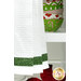 A super close up on the bottom of the towel, showing details on the towel texture and the fabric stripe.