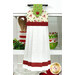 A head on shot of the completed Candy Cane Hanging Towel, colored in red, green, and white fabrics from the Peppermint & Pine collection by Marcus Fabrics, hung on kitchen drawer and staged with coordinating décor.