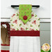 A super close up on the top of the towel, demonstrating fabric colors on the prints and fabric button.