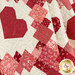 A close up on the draped quilt, demonstrating flow and form.