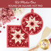 The two completed red Folded Star Hot Pads, one round and one square, slightly overlapping each other and staged on a white table with coordinating florals, buttons, and kitchen utensils.