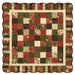 The completed Holiday Charm Quilt, colored in cream, green, and red fabrics from the Merry Manor Metallic 2025 collection, isolated on a white background. 