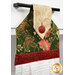 An angled close up on the top of the towel, demonstrating fabric colors on the prints and fabric button.