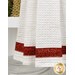 A close up on the bottom of the towel, showing details on the towel texture and the fabric stripe.