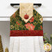 A close up on the top of the towel, demonstrating fabric colors on the prints and fabric button.