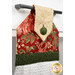 An angled close up on the top of the towel, demonstrating fabric colors on the prints and fabric button.