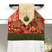 A close up on the top of the towel, demonstrating fabric colors on the prints and fabric button.