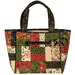 The completed Charming 8 Pocket Tote, colored in cream, green, and red fabrics from the Merry Manor Metallic 2025 collection, isolated on a white background. 