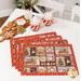 The four completed Self-Binding Placemats, fanned out and colored in red, black, beige, and green fabrics from the Very Merry Gingerbread collection by 3Wishes, staged on a white table with mugs of cocoa and adorable Christmas cookies.