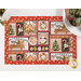 A top down shot of the placemat, showing details on the collage style print of gingerbread cookies and Christmas motifs.