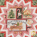 A top down shot of the center of the topper, showing details on the main collage style print as well as the coordinating folded points.
