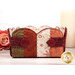 A close up on the side of the basket, showing details on the matching red buttons.