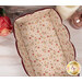 A top down shot of the inside of the basket, demonstrating details on the inner floral print.