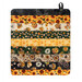 The completed Dry Ideas project, colored in black, yellow, cream, and green fabrics from the Sunflower Serenade collection by QT Fabrics, isolated on a white background. 