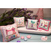 The completed projects, staged on a display plate and surrounded by coordinating sewing notions and décor. 