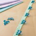 The triple wide sewing clip in use. 