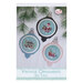 The front of the cross stitch pattern, showcasing the finished projects alongside the pattern name. 